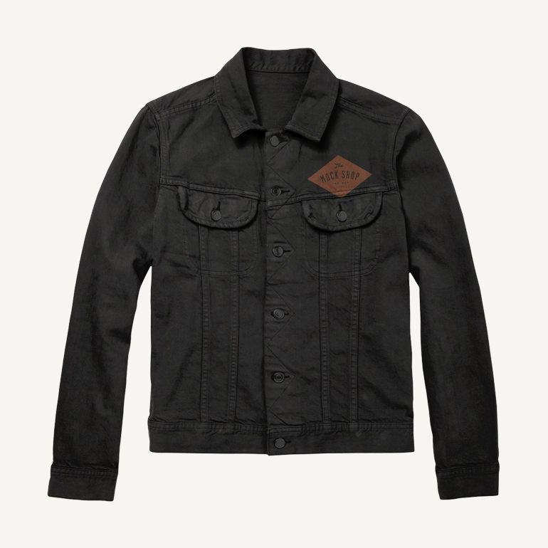 Back view mockup of a woman with a denim jacket posing by a chinese restaurant. Denim Jacket Mockup The Mock Shop